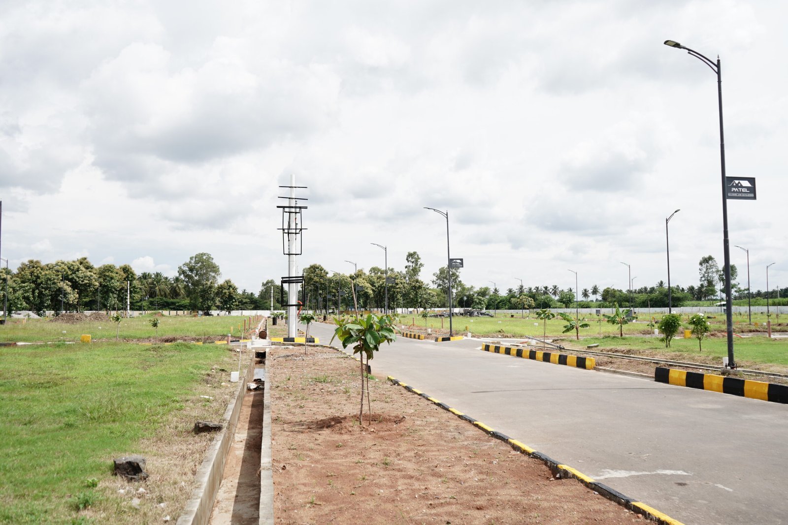 N K New Town development in Kollegala — site view 16