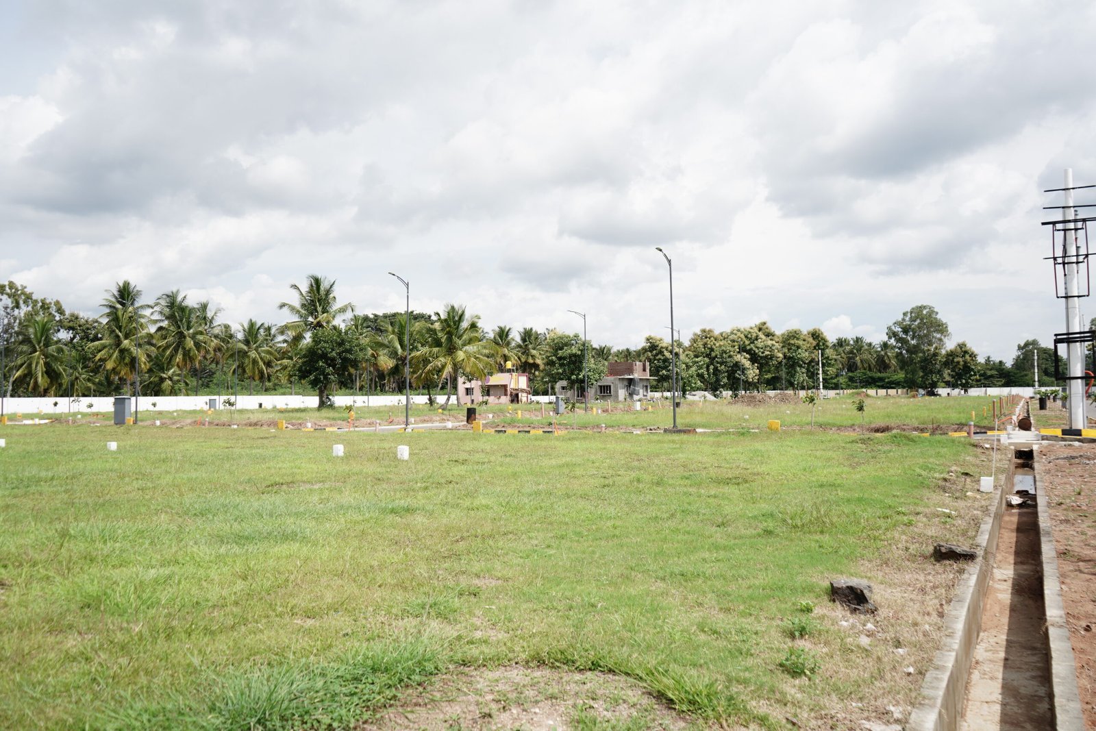 N K New Town development in Kollegala — site view 15